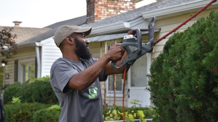Yard Clean-Up volunteers for seniors in Indianapolis neighborhood