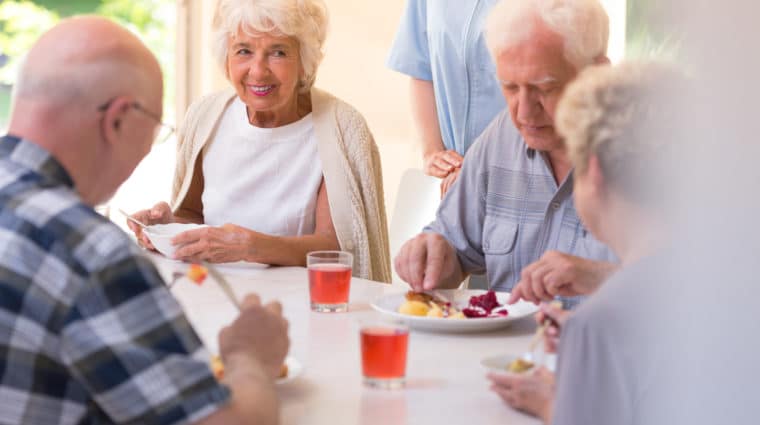 seniors eating at hospital cafeteria