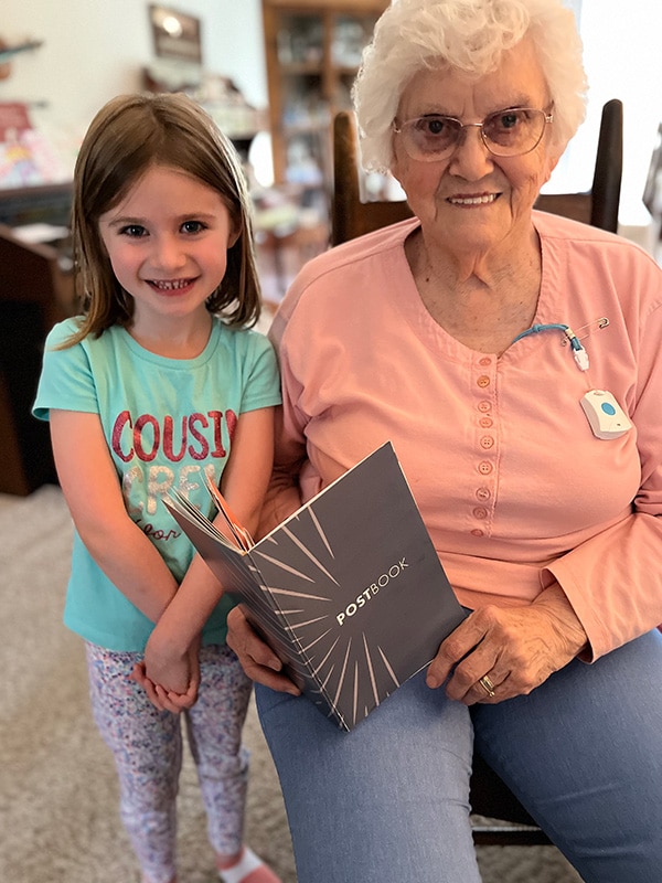 Granddaughter and Great Grandma with Postbook
