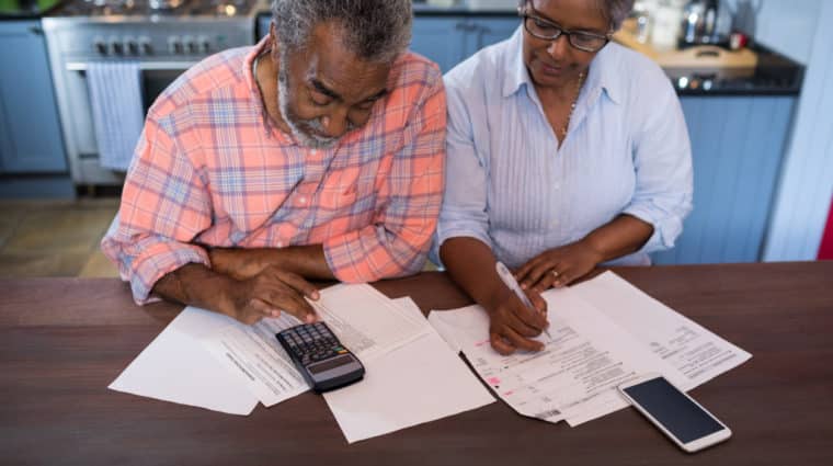 Older Couple Reviewing Finances and Budget
