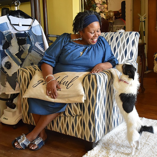 Lillie spends time at home working on denim crafts and taking care of her dogs
