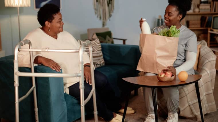 Community Health Worker helps a woman who had a recent fall gain access to healthy food at home