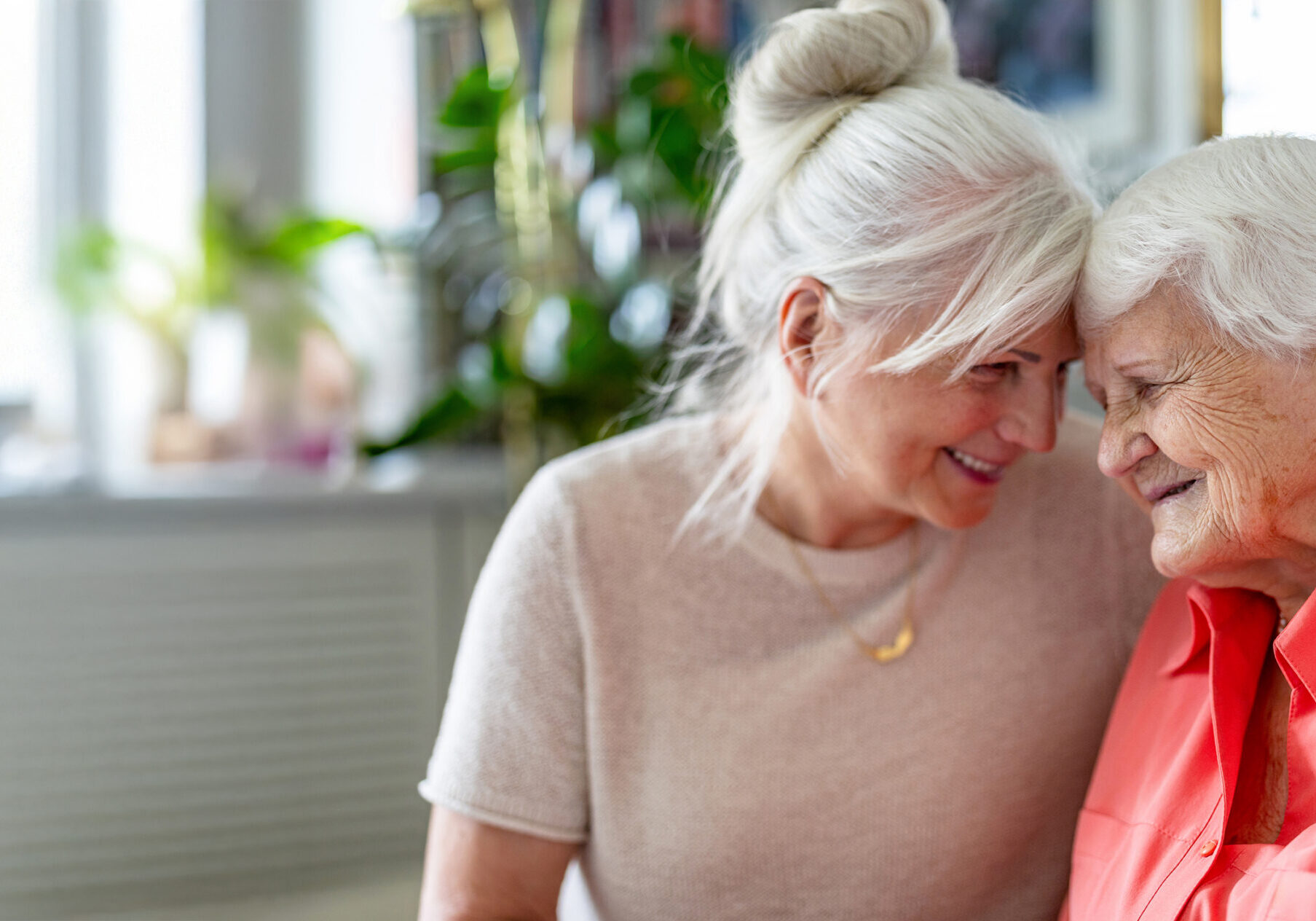 Daughter caring for her older mother at home