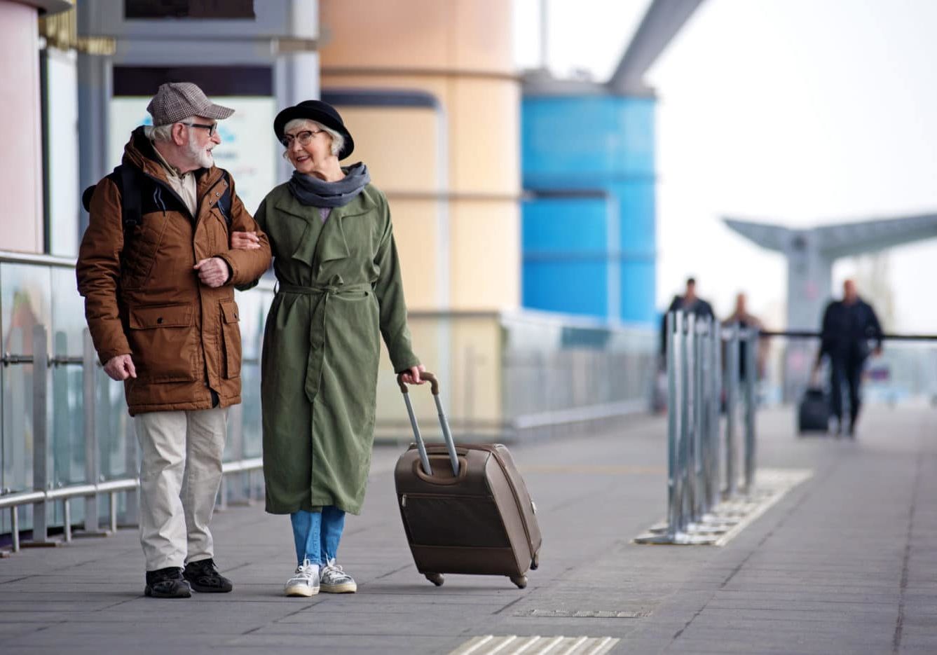 Pleasant Senior Couple Is Situating Near Airport